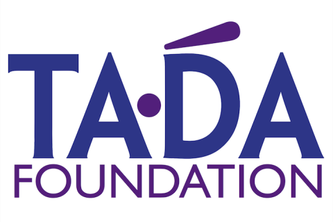In big bold typeface, the letters TA and DA separated by a dot, and the word FOUNDATION below it